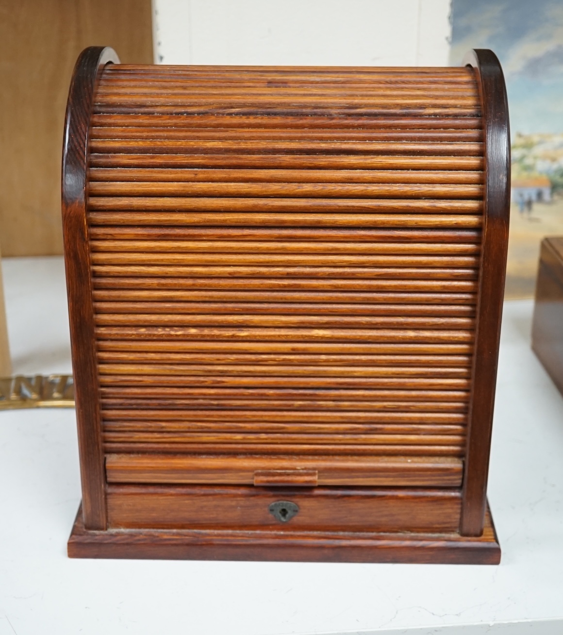 A tambour fronted stationery rack, 30cm high. Condition - fair